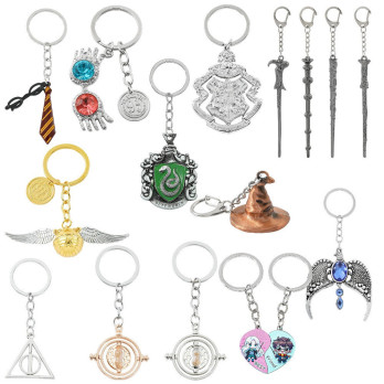 METALOWY BRELOK HARRY POTTER RÓŻNE WZORY GRYFFINDOR TIARA ZMIENIACZ CZASU