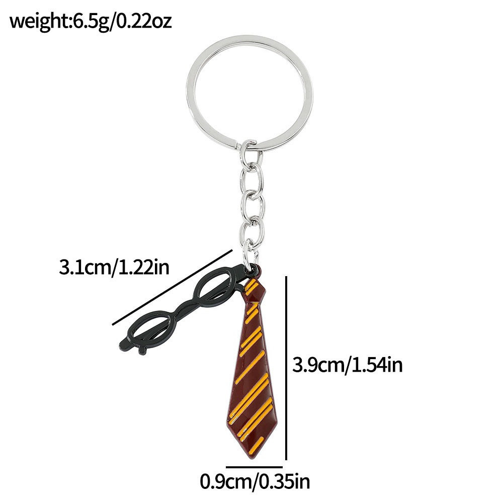 METALOWY BRELOK HARRY POTTER RÓŻNE WZORY GRYFFINDOR TIARA ZMIENIACZ CZASU