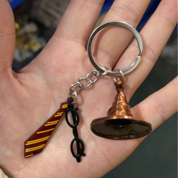 METALOWY BRELOK HARRY POTTER RÓŻNE WZORY GRYFFINDOR TIARA ZMIENIACZ CZASU
